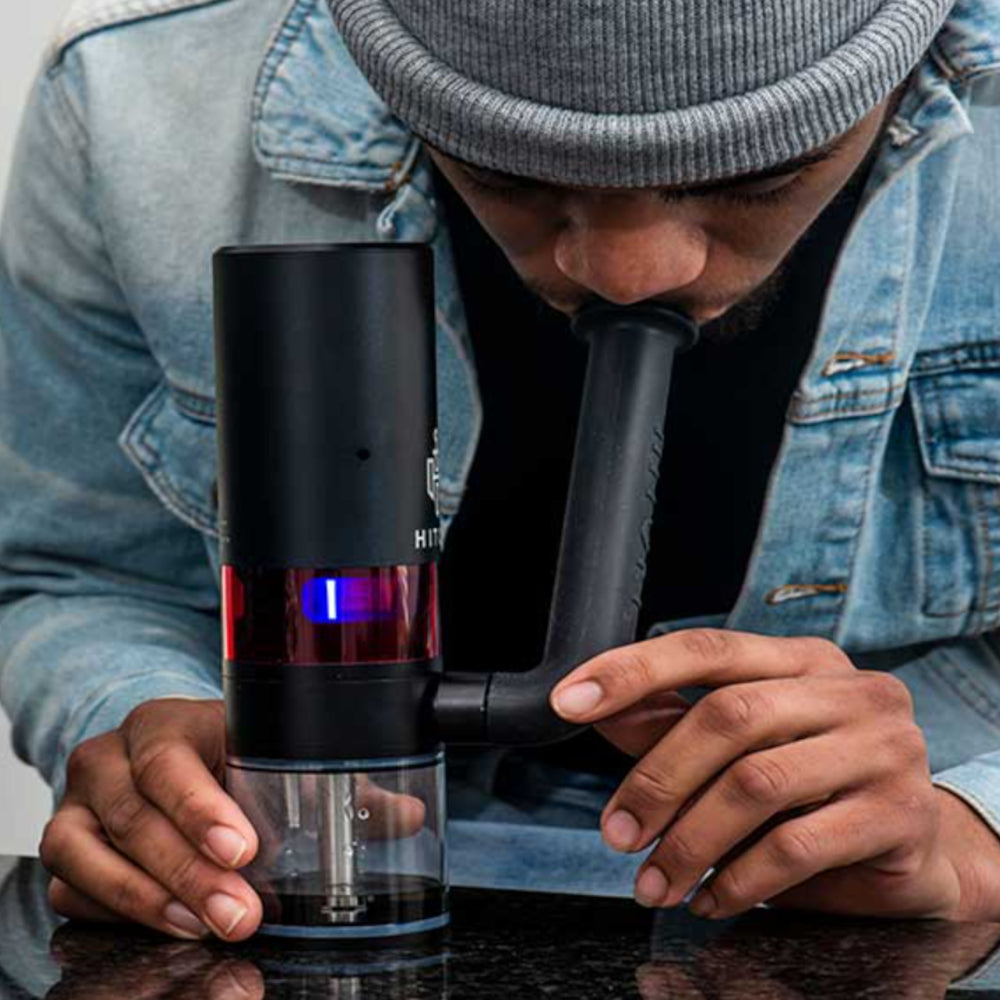 Person using Hitoki Trident with Adjustable Silicone Mouthpiece for easy vaping