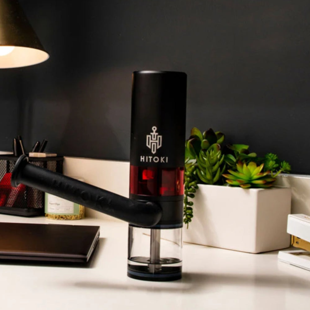 Hitoki Trident with Adjustable Silicone Mouthpiece on desk, sleek design, office background