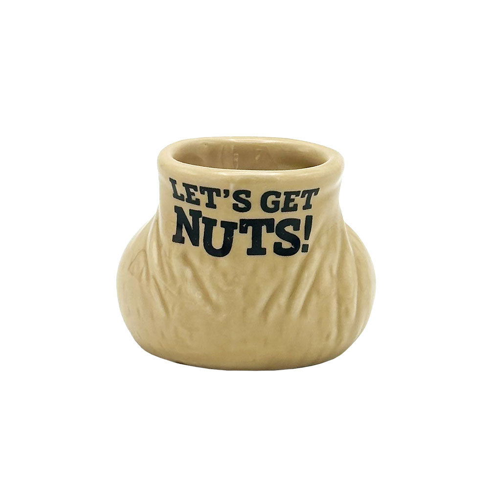 Ceramic shot glass with "Let's Get Nuts" print, 2oz capacity, front view on white background
