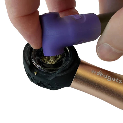 Weedgets Sili-Scoop Herb Loader in use, compact design, perfect for on-the-go tamping