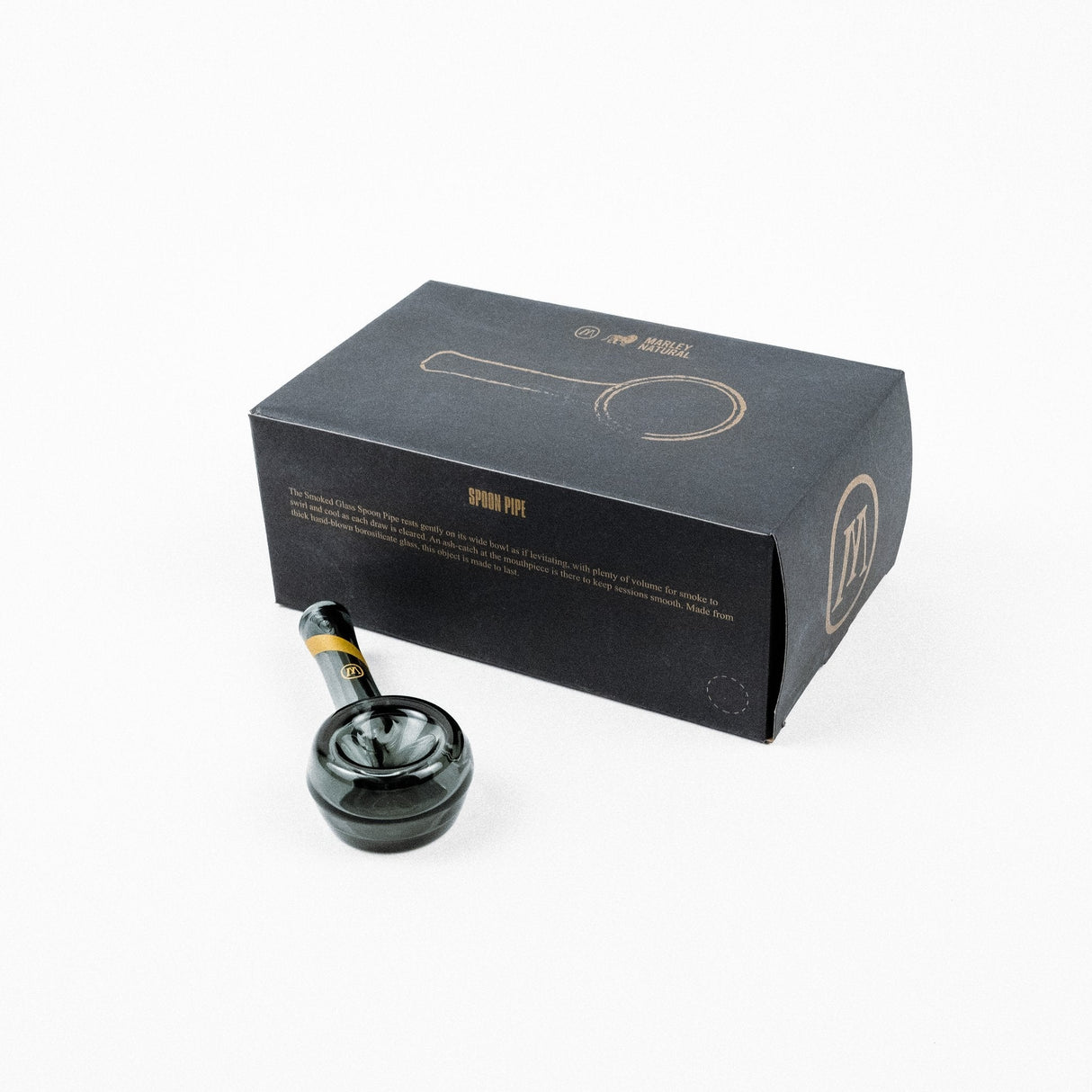Marley Natural Smoked Glass Spoon Pipe with Gold Stripe Decal beside its box