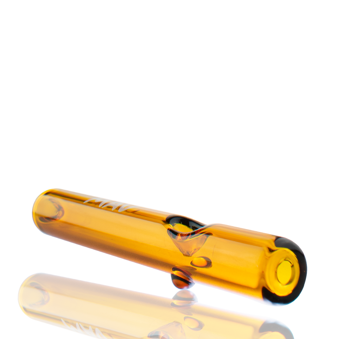 MAV Glass 7" Gold Steamroller Pipe - Angled Side View on Reflective Surface
