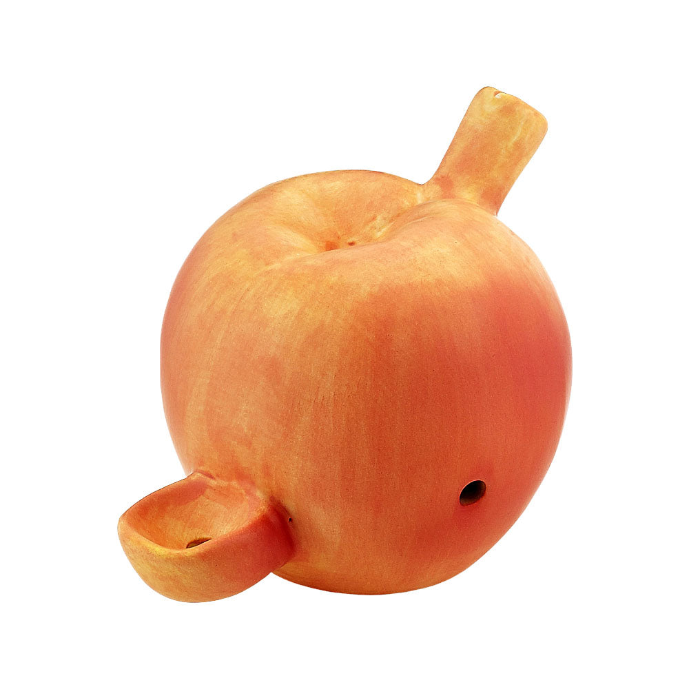 Mini Peach Ceramic Pipe, compact hand pipe design, front view on white background