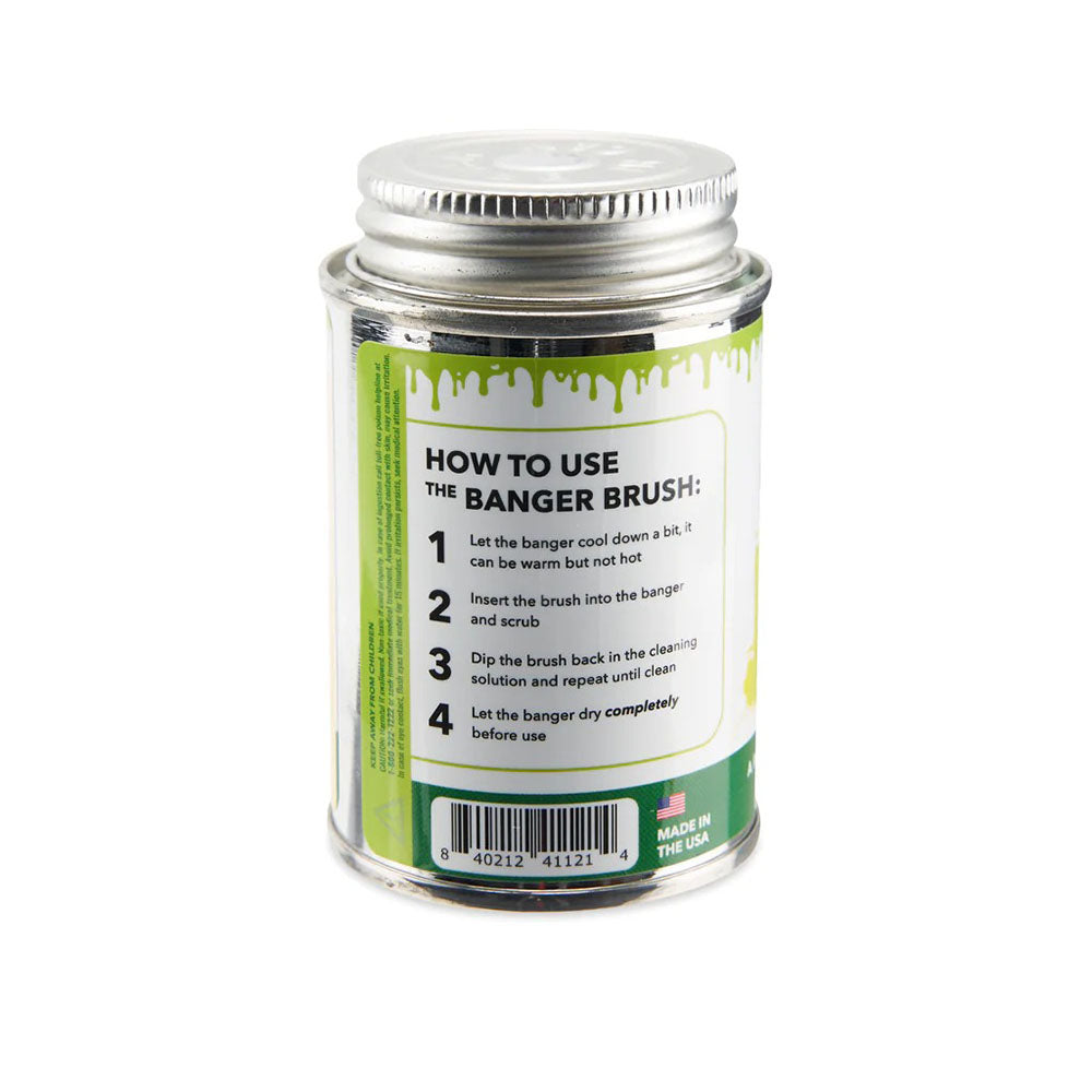 Ooze Resolution Banger Brush 10-piece set in clear display jar, angled view with usage instructions