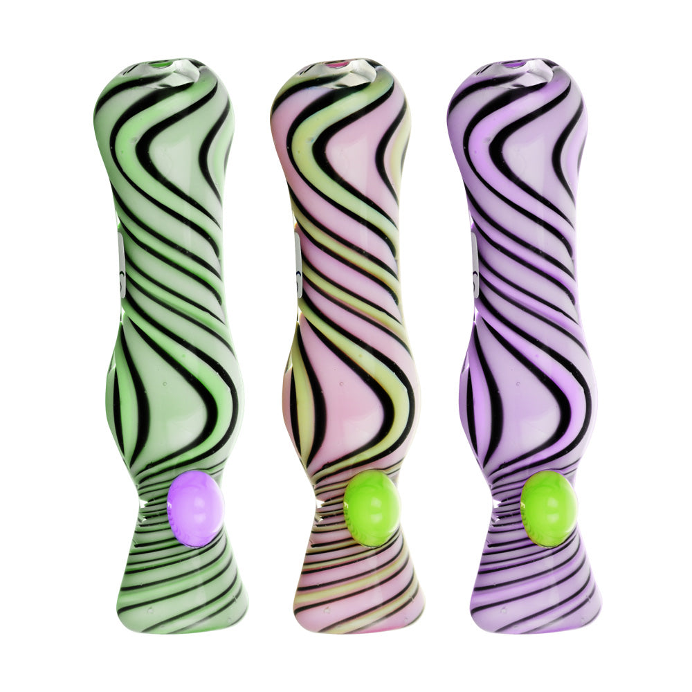 Assorted pastel-colored taster pipes with black swirl design, front view, perfect for dry herbs