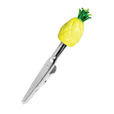 Pineapple-shaped glass roach clip with a metallic handle, front view on white background