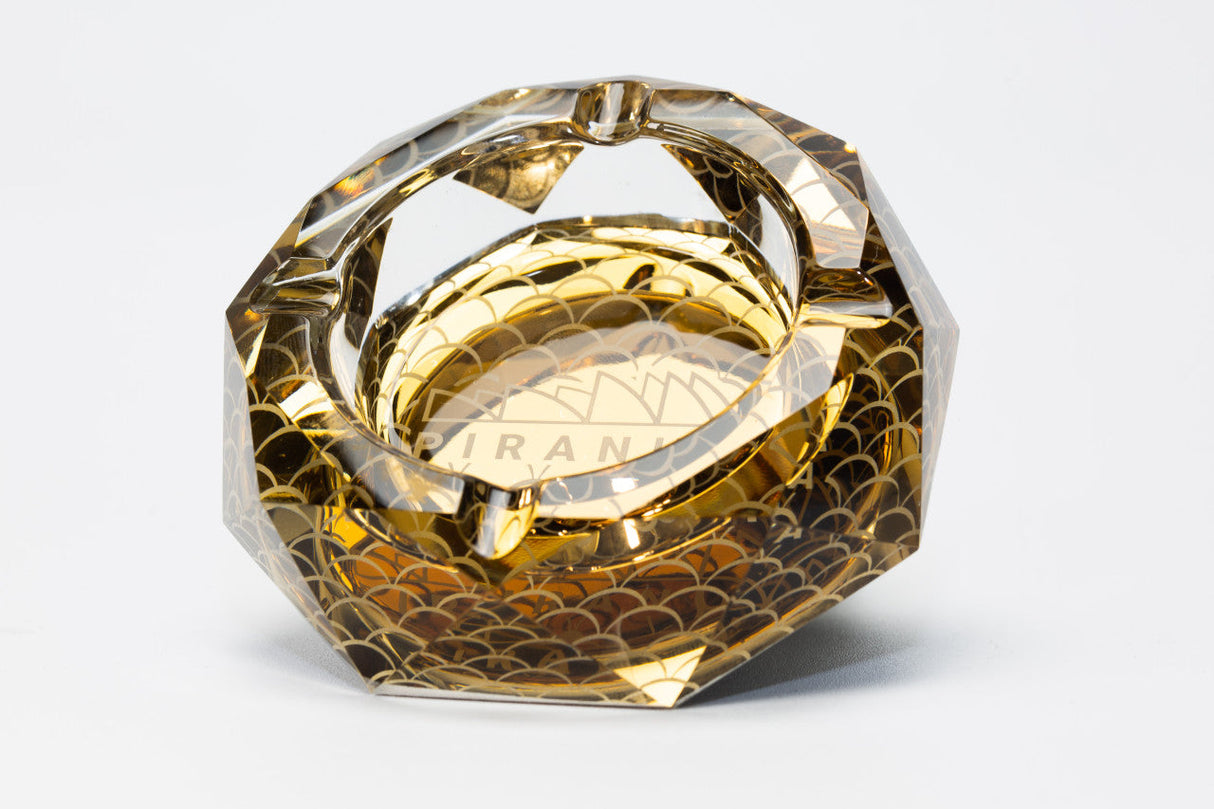 Piranha Glass Anise Star Ashtray, heavy wall borosilicate glass with reflective facets, front view