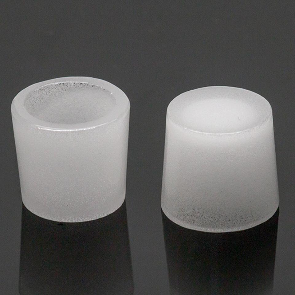 Puffco Peak Gavel Bowl duo on reflective surface, ideal for vaporizers and concentrates