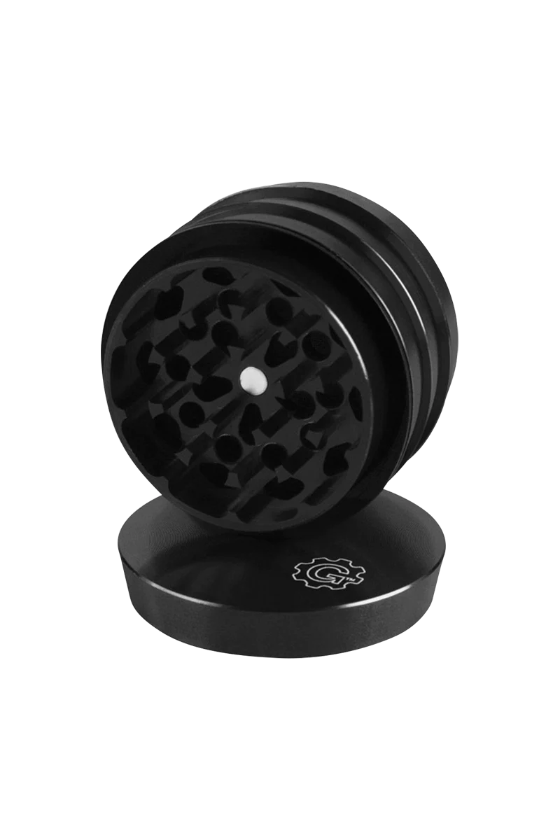 Pulsar 2" Black Aluminum 4pc Grinder, compact design with sharp teeth, ideal for dry herbs, angled view