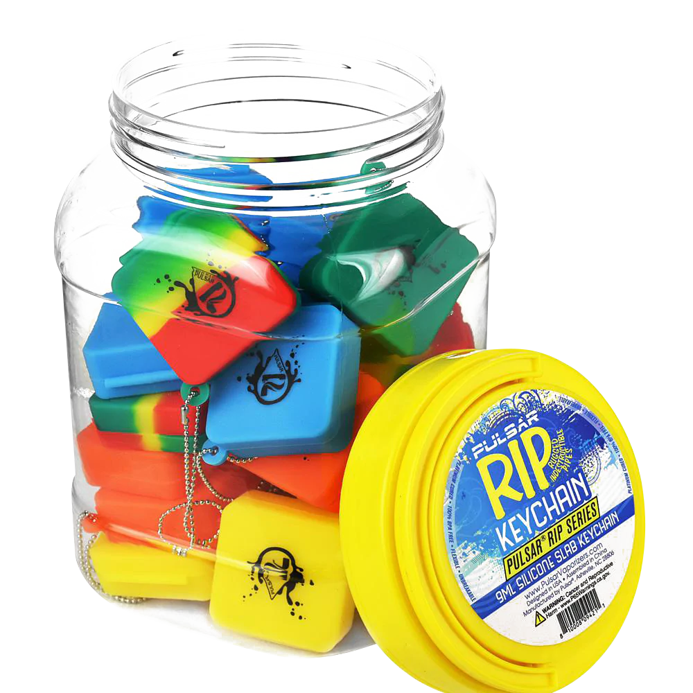 Assorted Pulsar Silicone Dab Slab Containers in a clear jar, compact and portable, 9mL size