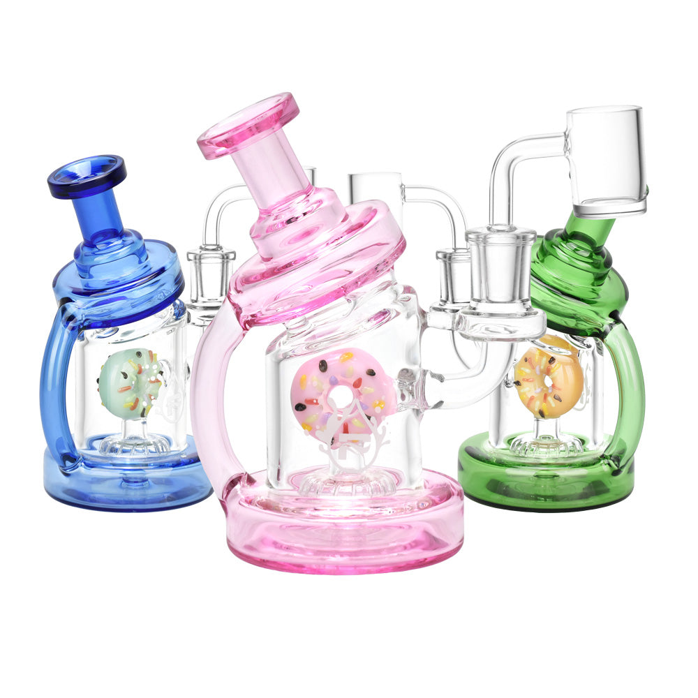 Pulsar Smoking Donuts Dab Rigs in blue, pink, and green with unique donut designs