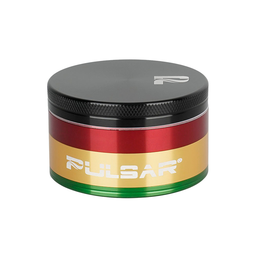 Pulsar Solid Top Aluminum Grinder in Rasta colors, 4pc set with textured grip, front view on white