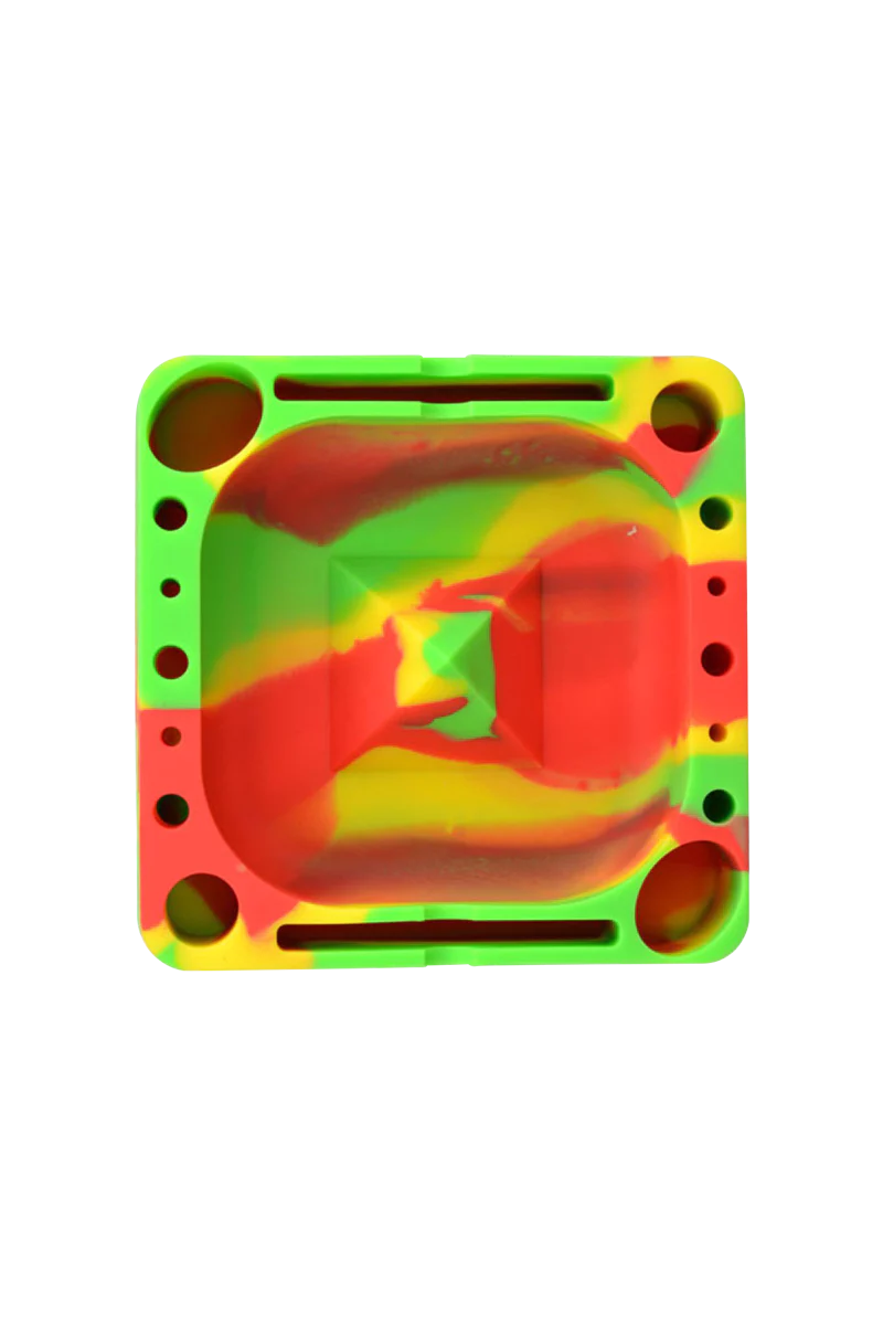 Pulsar Tap Tray in vibrant tie-dye silicone, top view, for dry herbs and concentrates