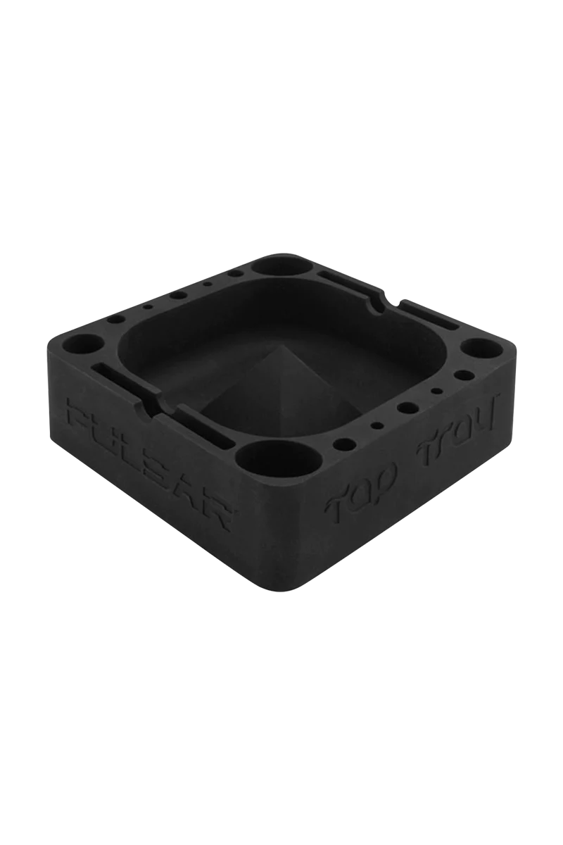 Pulsar Tap Tray in black silicone, angled view, with compartments for dry herbs and concentrates