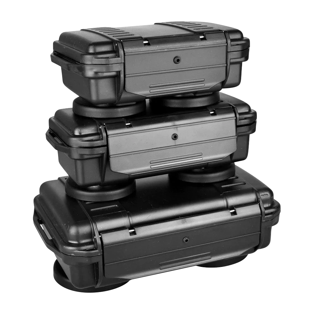 Stack of three black Secret Safe hard cases with vacuum seal and rubber padding, portable design