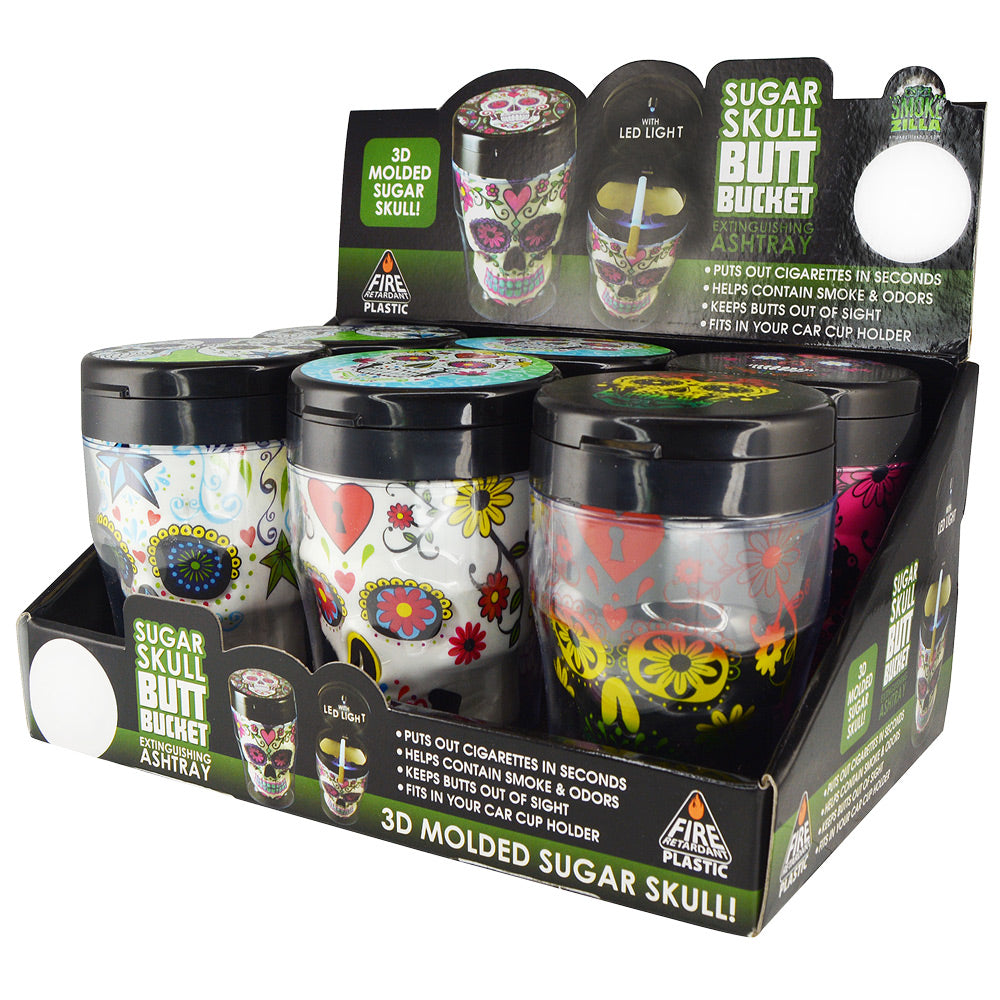 Smokezilla 3D Sugar Skull Ashtray 6-pack in assorted colors, displayed in packaging