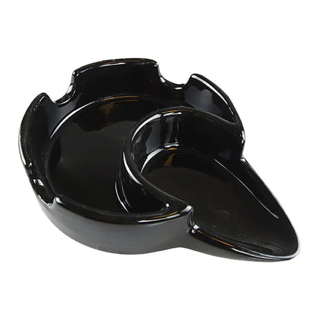 Smokezilla black ceramic ashtray with pipe holder, compact design, top view on white background