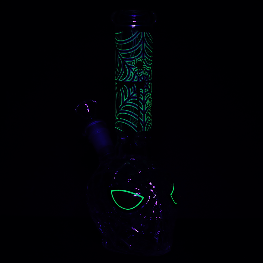 Novelty glass water pipe with a spider face base and dripping web decals, 14mm female joint, 9.75 in