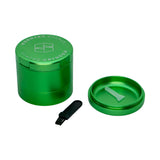 Stache Products Grynder in vibrant green, 5-piece compact design, perfect for dry herbs, top view