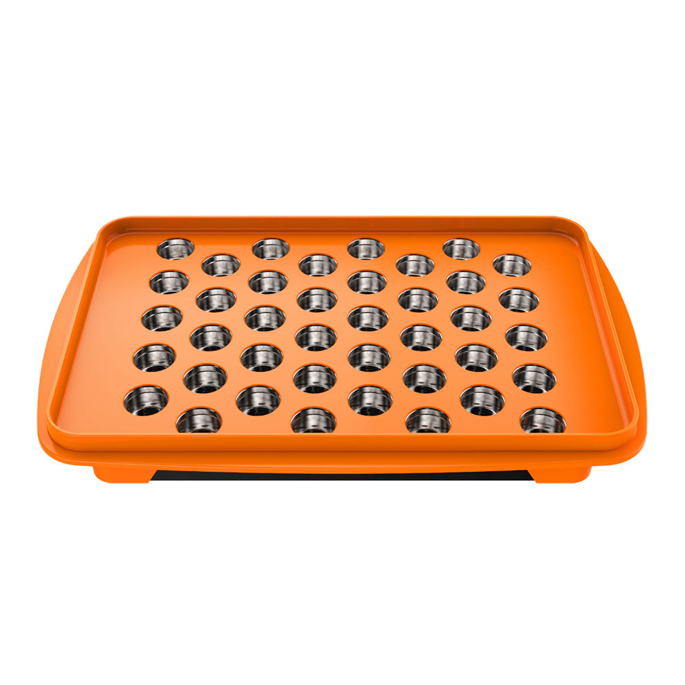 Storz & Bickel orange dosing capsule filling set for vaporizers, top view on seamless white background