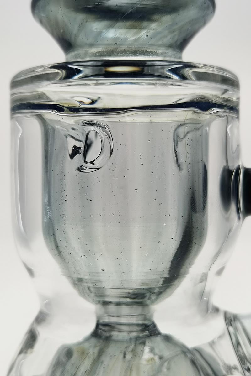 Close-up of TAG 12" Faberge Egg Klein Incycler with clear glass and blue accents