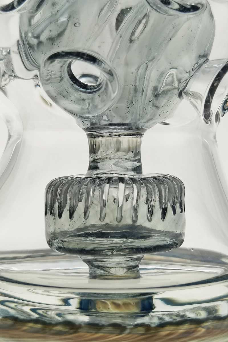 Close-up of TAG 12" Faberge Egg Klein Incycler with intricate percolator design, clear glass, 14MM female joint.