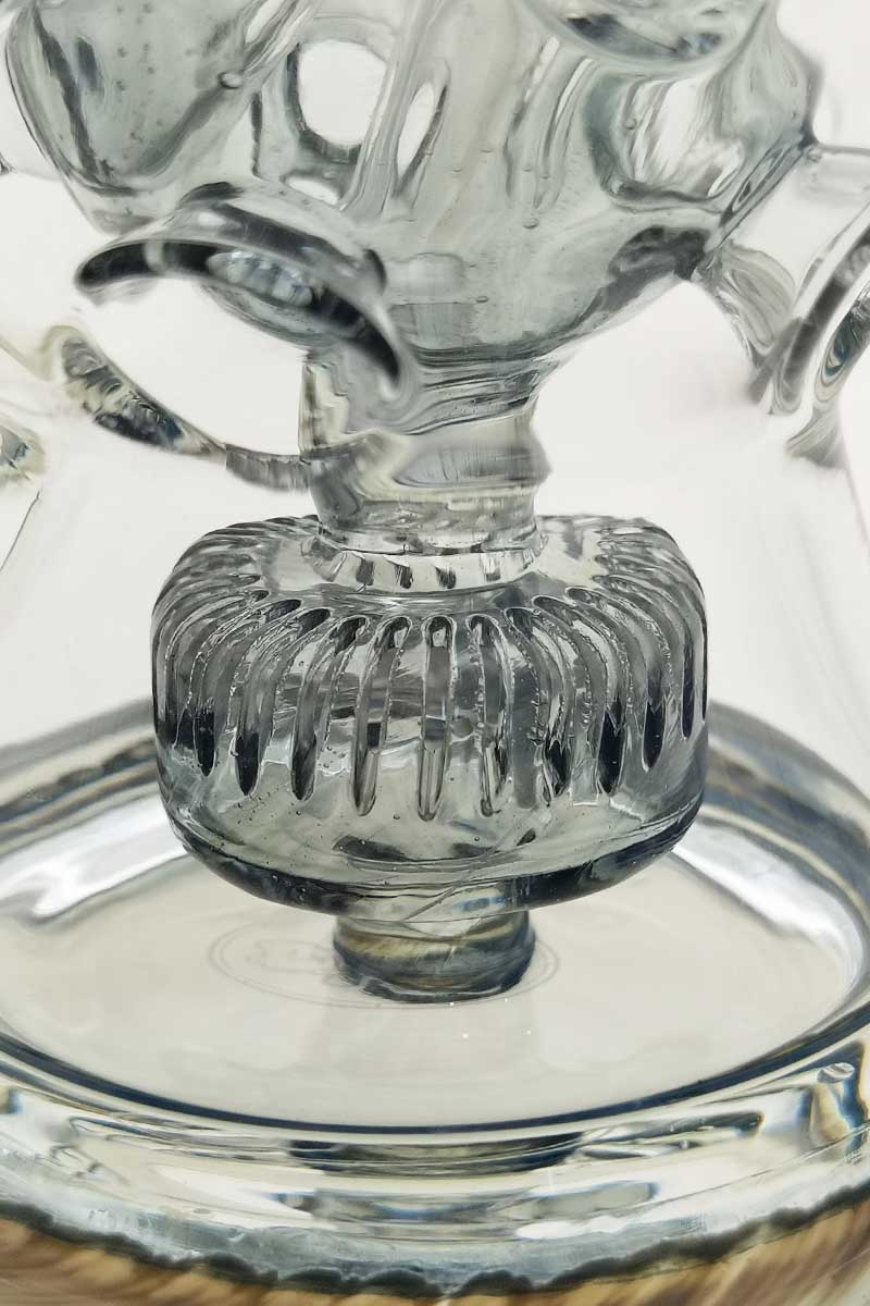 Close-up of TAG 12" Faberge Egg Klein Incycler with intricate percolator design, clear glass, 14MM Female joint