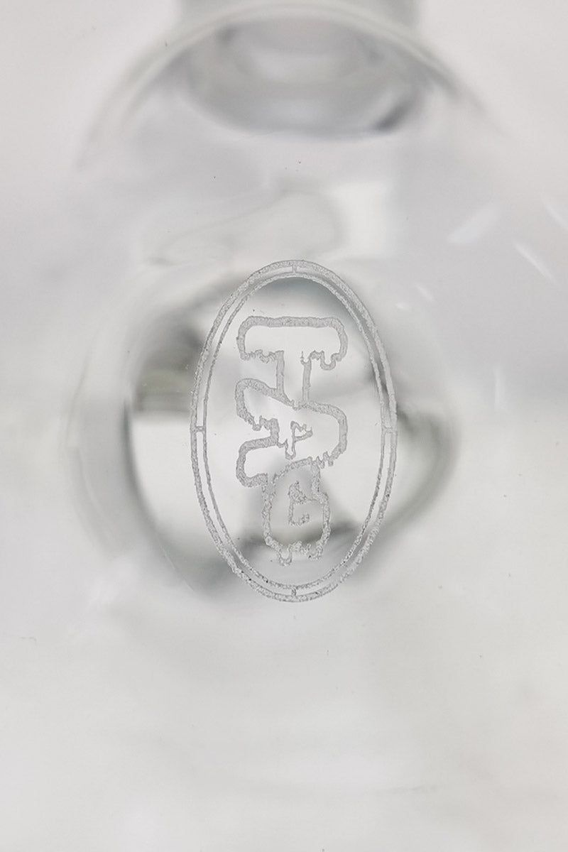 Close-up of TAG 16" Beaker Bong 50x5MM with 18/14MM Downstem, showcasing the Thick Ass Glass logo