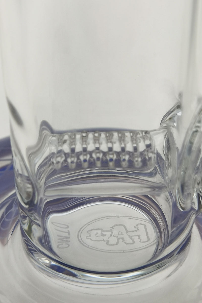 Close-up view of TAG 19" glass bong base with super slit inline percolator and logo detail