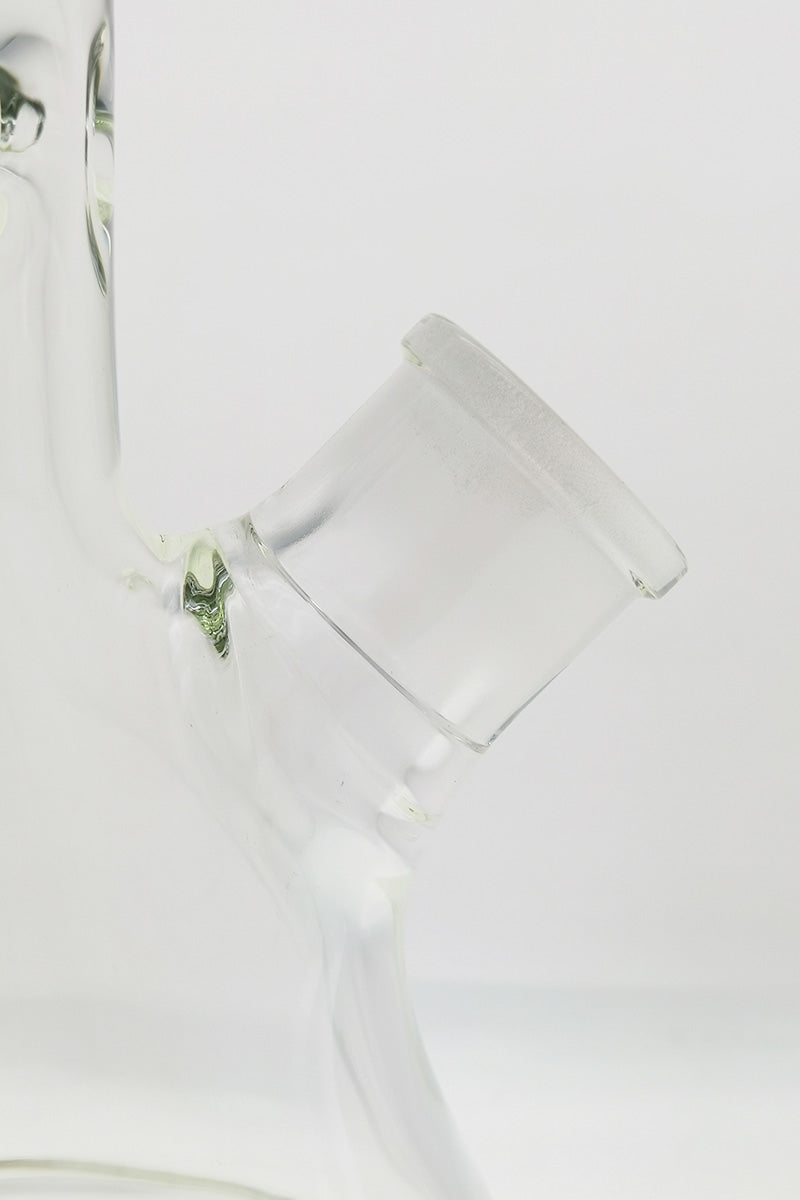 Close-up of TAG 30" Rasta Beaker Bong's 28/18MM downstem, showcasing heavy wall thickness.