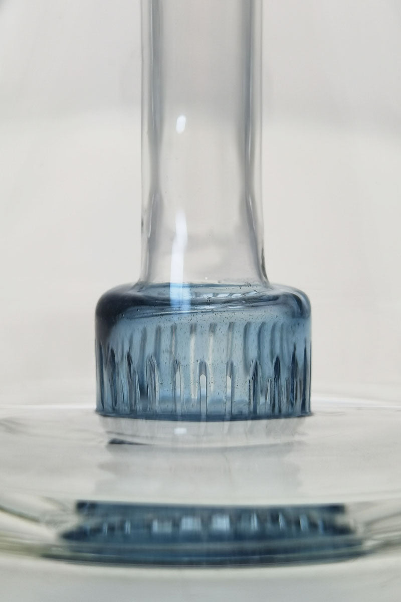 Close-up of TAG 6" Fixed Showerhead Puck Pyramid Rig base with blue accents