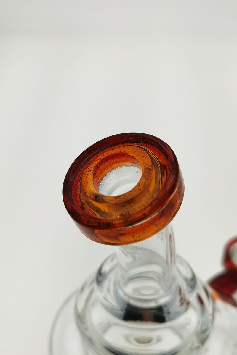 Close-up of TAG 8" Bent Neck Dab Rig with Amber Bellow Ball and Clear Base