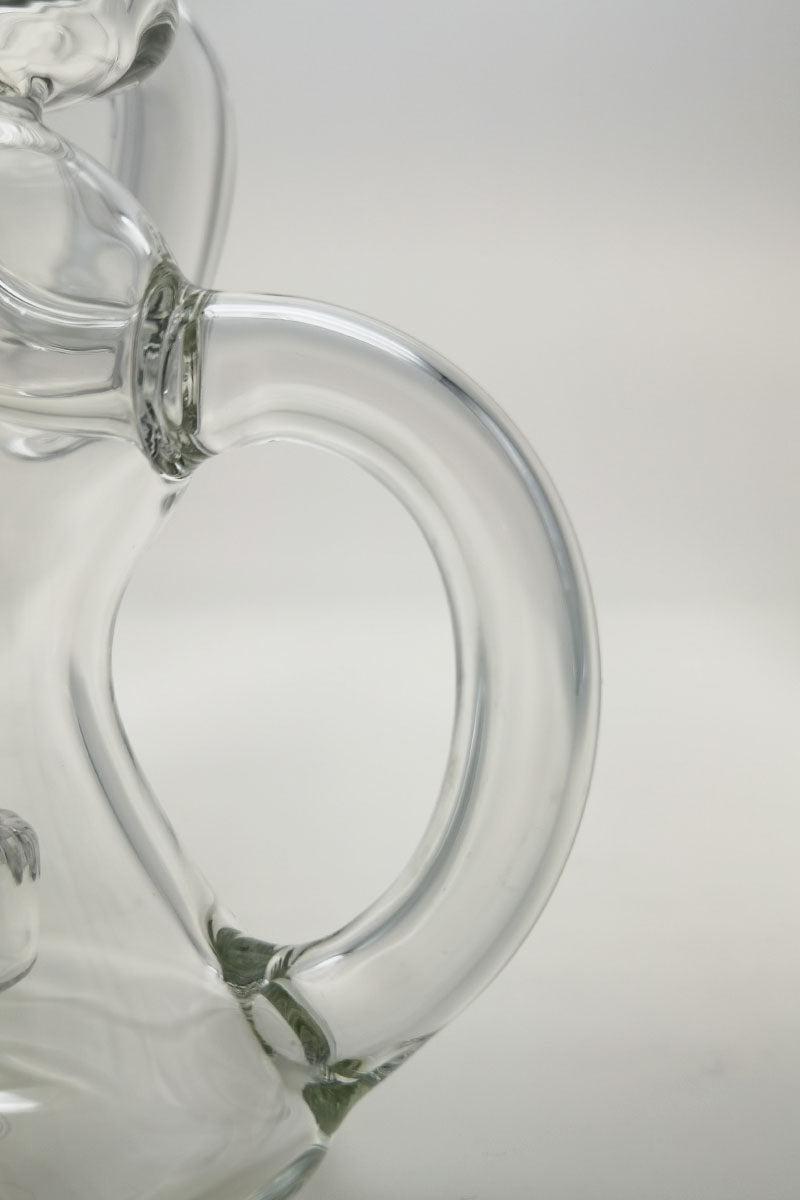 Close-up of TAG 8" Bent Neck Dab Rig with Clear Super Slit Puck Diffuser, Side Angle