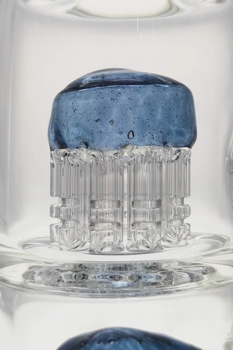 Close-up view of TAG bent neck dab rig with double 6-arm tree percolator and 14MM female joint