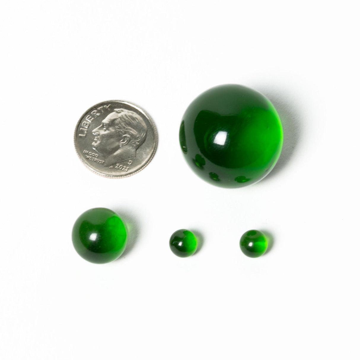 aLeaf Terp Slurp Pearl Set in Mixed US Colors, 3 pc Mix with a dime for scale, top view