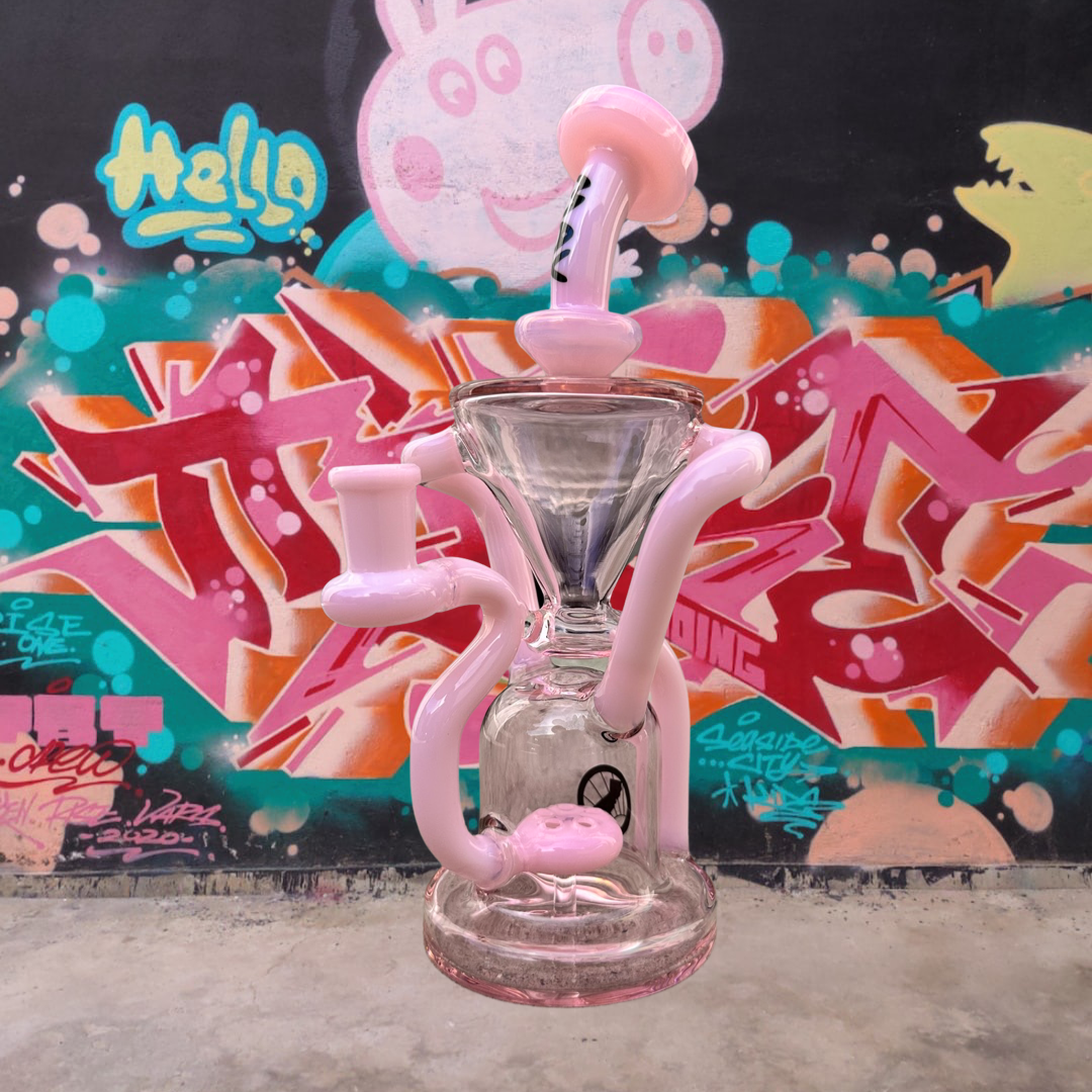 MAV Glass Humboldt 9" Dab Rig with pink accents, Waffle Perc & Vortex Drain, front view on graffiti background