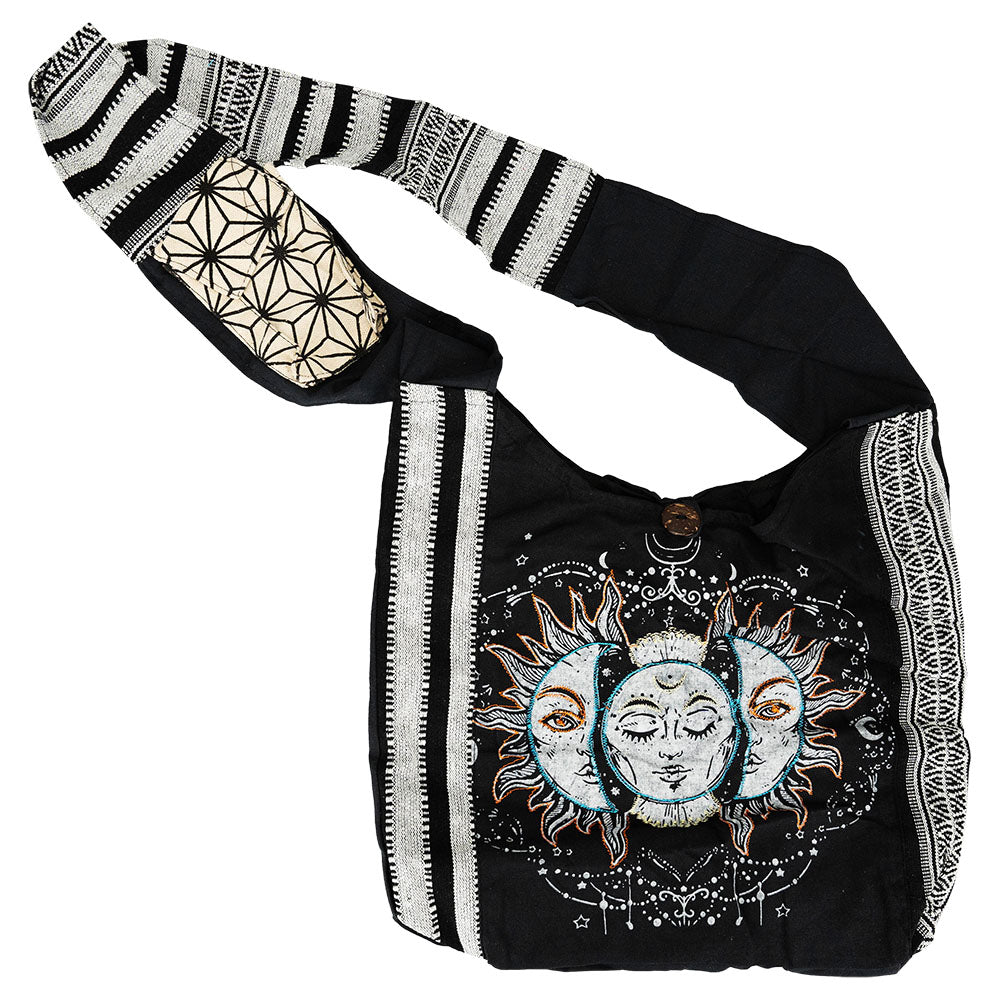 ThreadHeads Sun & Moon Striped Sling Bag in black and white, front view on a white background