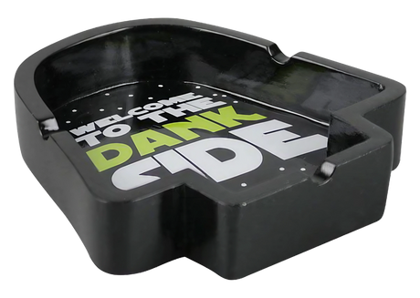 Black polyresin 'Welcome to the Dank Side' ashtray, top view on a seamless white background
