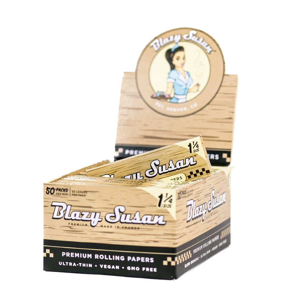 Blazy Susan 1 1/4 Unbleached Rolling Papers stacked on display