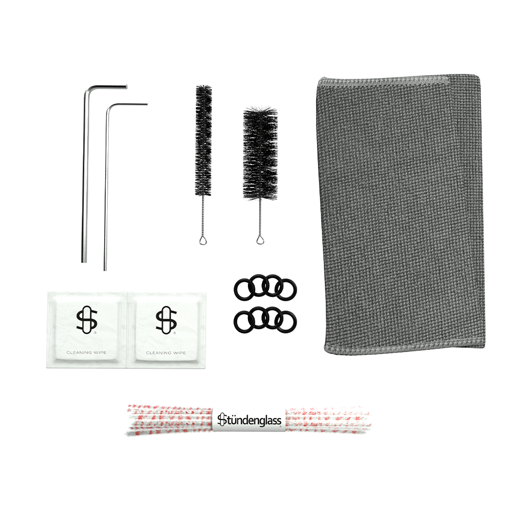 Stündenglass Maintenance Kit with brushes, cleaning wipes, and accessories on white
