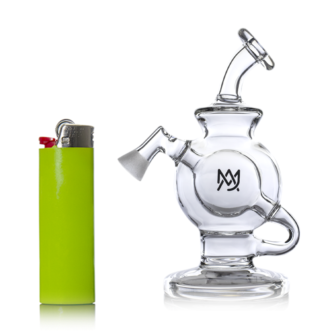 MJ Arsenal Atlas Vape Edition mini dab rig with quartz banger, front view beside green lighter