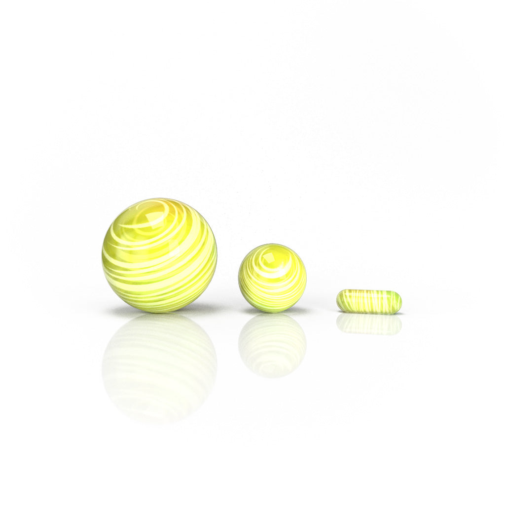 Honeybee Herb Dab Marble Sets in assorted sizes, yellow swirl pattern, borosilicate glass