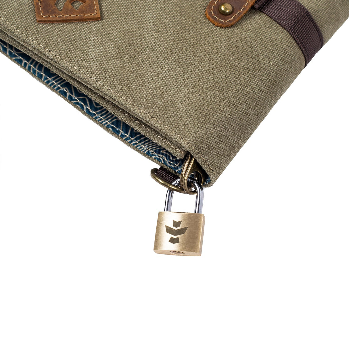 Close-up of Revelry Supply's The Rolling Kit with secure lock, smell-proof design, and stylish fabric.