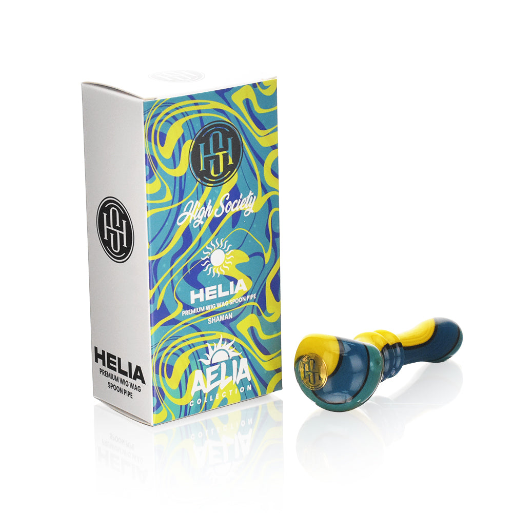 High Society Helia Premium Wig Wag Spoon Pipe next to its vibrant packaging box