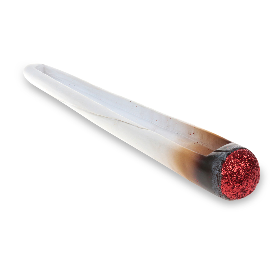 Fantasy Polyresin Incense Stick Burner with Glittery Red End, Side View on White Background