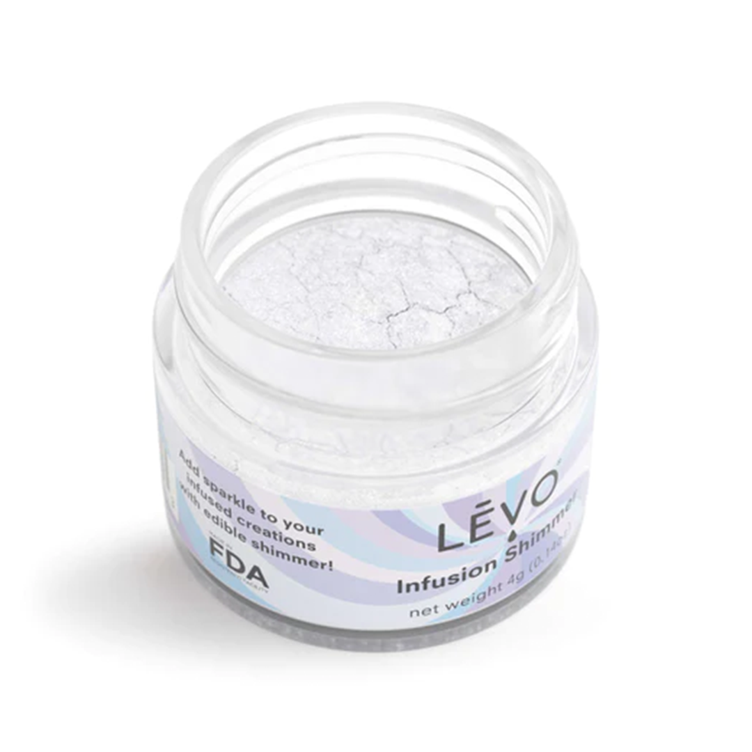 LEVO Oil Edible Glitter in a clear jar, angled view, adds sparkle to homemade gummies