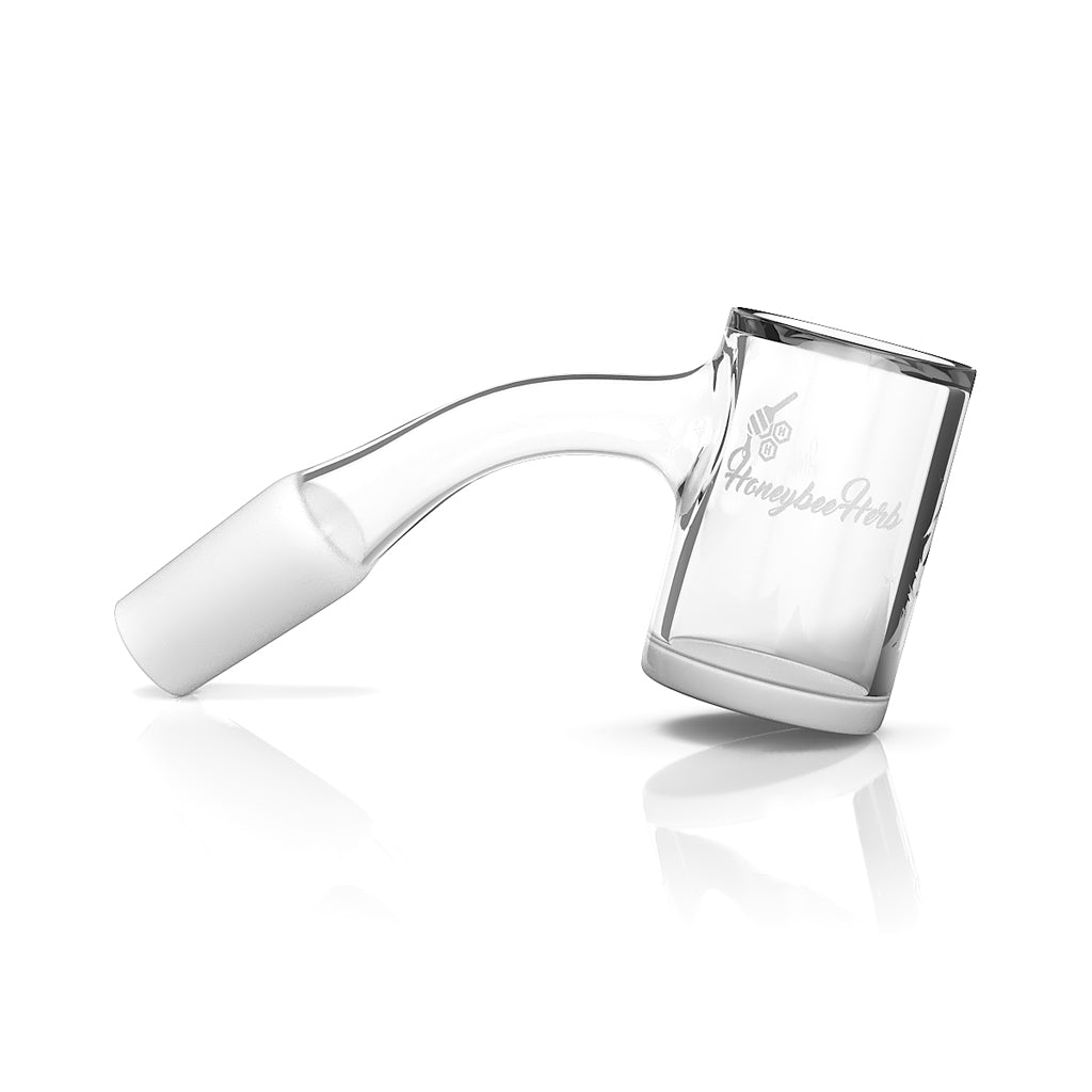 Honeybee Herb Quartz Banger at 45° angle, clear male joint for dab rigs, side view on white background