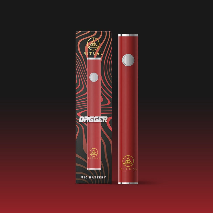 Ritual Dagger 510 Red Variable Voltage Pen Battery with packaging on a dark background
