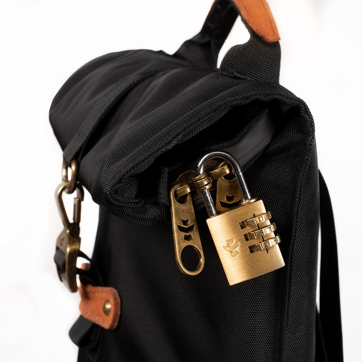 Close-up of The Defender smell proof padded backpack by Revelry Supply with lock detail