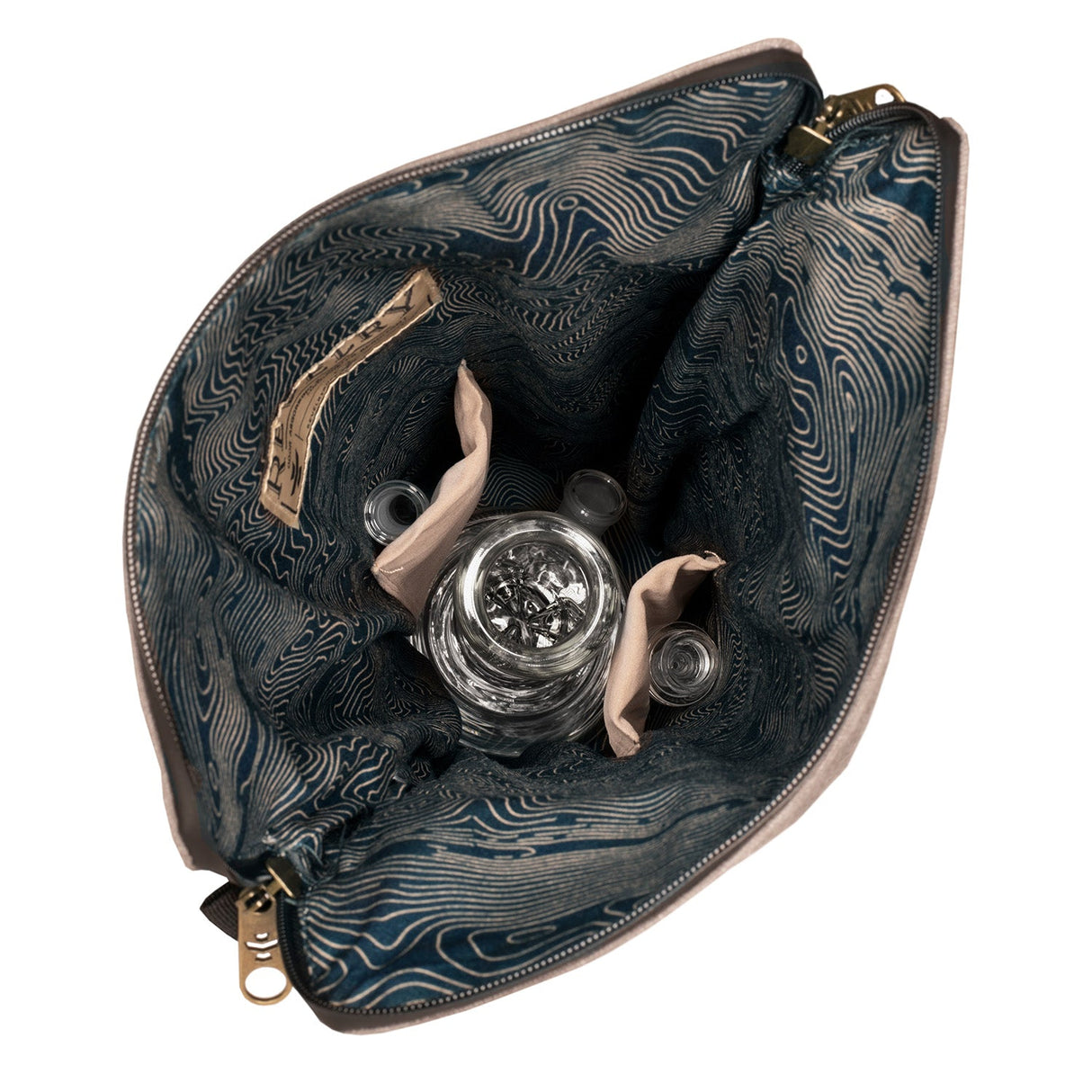 Top view of The Defender Smell Proof Padded Backpack by Revelry Supply with open compartment